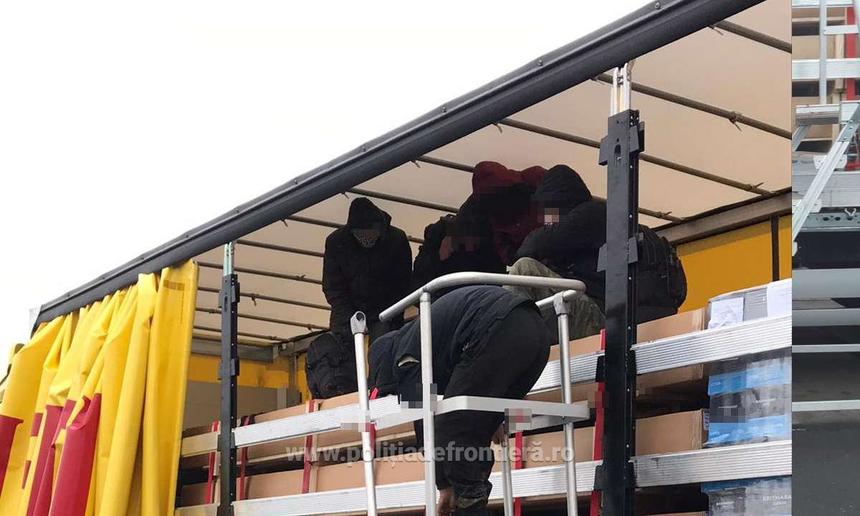 Arad: 28 de migranţi din Afganistan şi Siria, printre care şi copii, prinşi când încercau să treacă ilegal frontiera cu Ungaria, ascunşi în automarfare - FOTO, VIDEO
