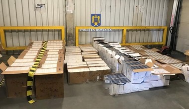 Timişoara: Bărbat reţinut pentru contrabandă cu ţigări / Pachetele cu 750.000 de ţigarete, ascunse după lăzi cu mere
