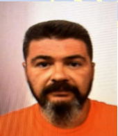 Bărbatul evadat dintr-o maşină care-l transporta la Penitenciarul Rahova, prins de poliţişti în Argeş / Un prieten care l-a găzduit, deşi ştia că este urmărit, a fost reţinut