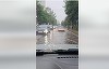 Străzi inundate în municipiul Iaşi, în urma unei ploi torenţiale / Pe DN28, în zona localităţii Strunga,  intervin echipele Secţiei Drumuri Naţionale (SDN) Iaşi pentru degajarea copacilor rupţi şi a crengilor căzute pe marginea carosabilului - FOTO