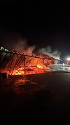 Mureş - Incendiu la un depozit de cărbuni din localitatea Bălăuşeri. Au ars o hală industrială şi o casă - FOTO