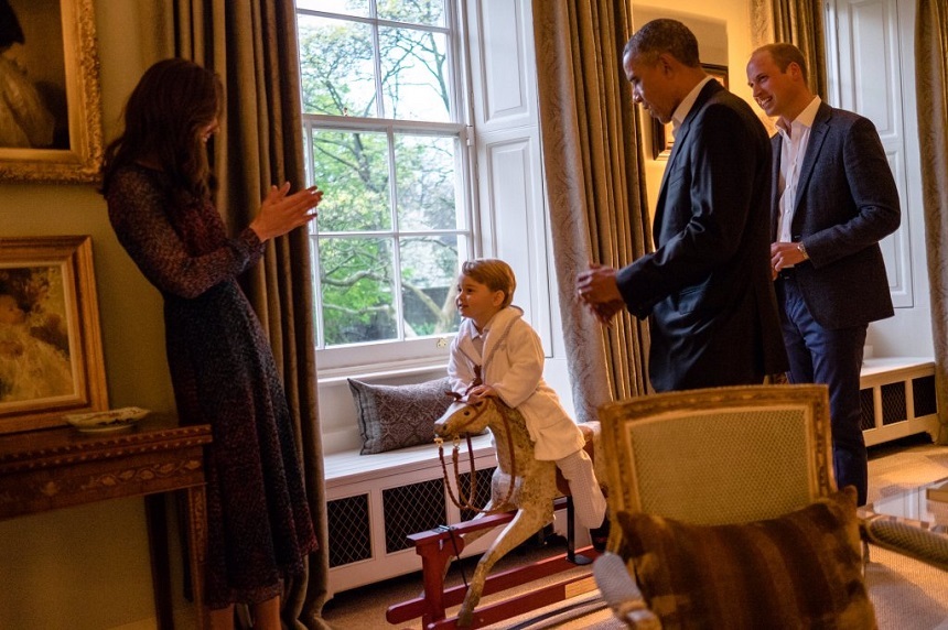 Prinţul George i-a întâlnit vineri pe preşedintele american Barack Obama şi pe Prima Doamnă