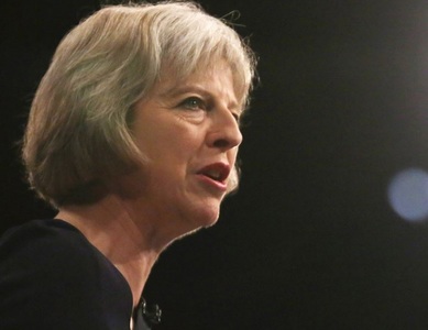 Premierul Theresa May susţine că Marea Britanie nu va negocia rămânerea în UE ”pe uşa din spate”