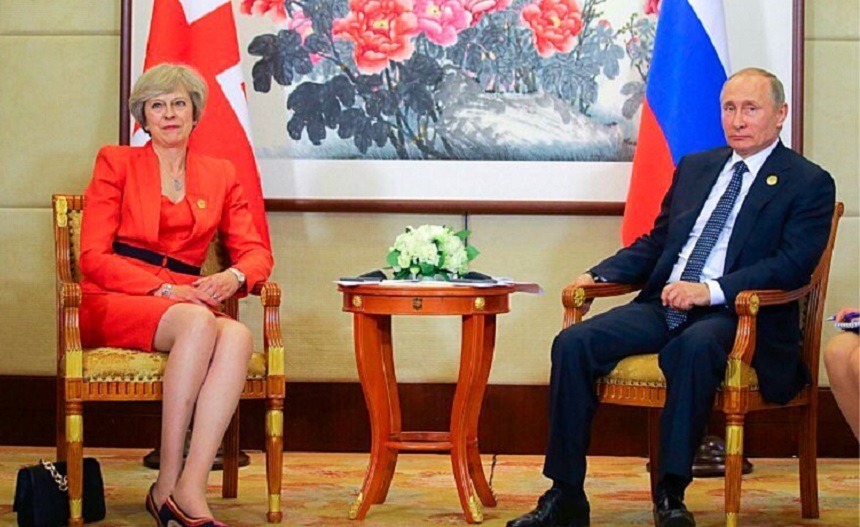 May şi Putin îşi exprimă, în prima lor întâlnire, speranţa unei îmbunătăţiri a relaţiilor britanico-ruse 