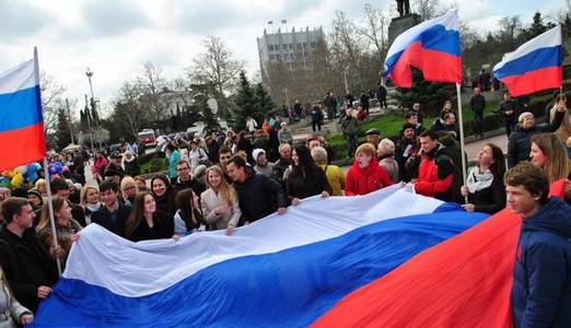 Locuitori ai unor oraşe din Crimeea şi Rusia marchează trei ani de la anexarea peninsulei ucrainene