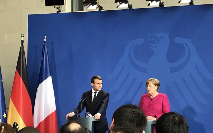 Macron se angajează să coopereze cu Merkel la o ”foaie de parcurs” a reformării UE şi zonei euro
