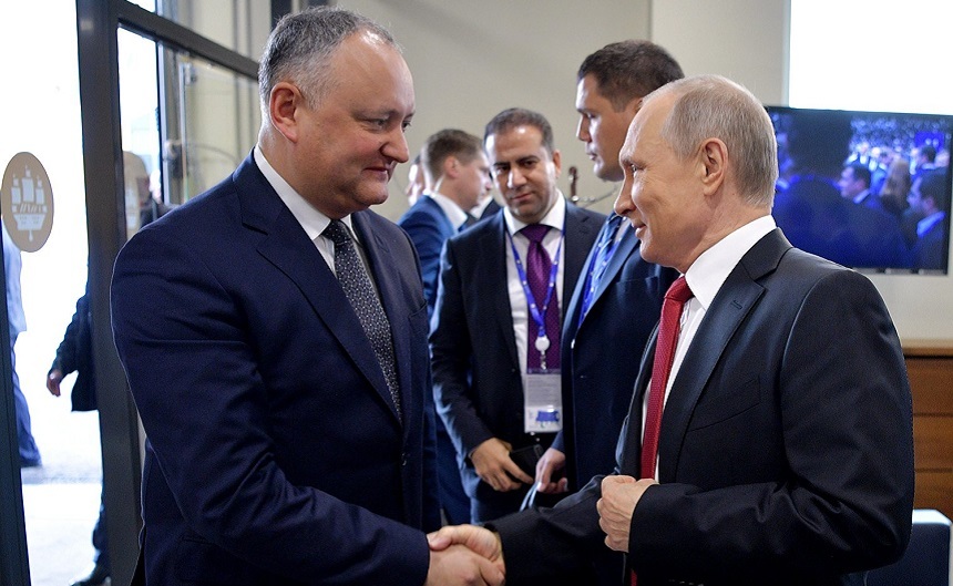 Putin a promis că nu va lua alte măsuri după expulzarea diplomaţilor de la Chişinău, spune Dodon