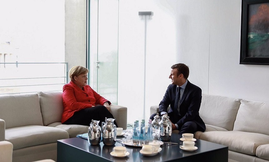 Merkel salută victoria partidului lui Macron în alegerile legislative drept un "vot puternic pentru reforme"