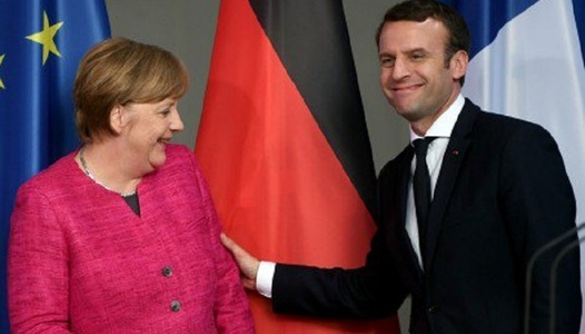 Merkel se declară pregătită să discute ideile lui Macron cu privire la o reformare a zonei euro