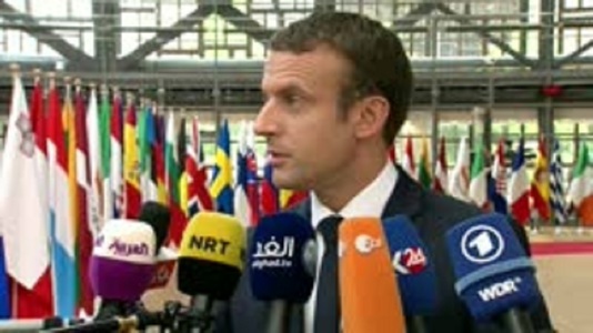 Macron spune la sosirea la summitul UE că vrea o politică comercială deschisă dar care să protejeze