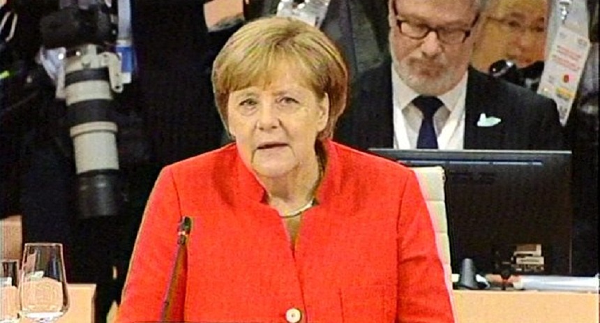 Milioane de oameni speră ca G20 să rezolve problemele lumii, le spune Merkel omologilor săi la un prânz de lucru pe tema creşterii economice şi comerţului