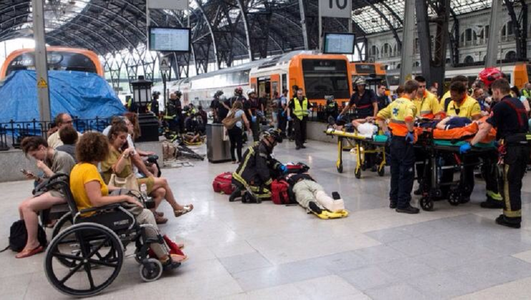 Autorităţile spaniole au revizuit bilanţul accidentului feroviar de la Barcelona la cel puţin 54 de răniţi