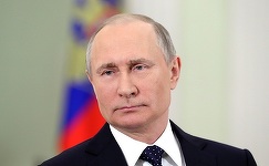 Sub focul criticilor occidentale, Vladimir Putin se pregăteşte să triumfe la urne