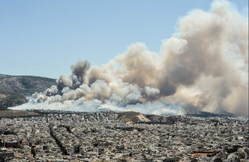 Grecia - Cel puţin 50 de oameni şi-au pierdut viaţa în incendiile de vegetaţie din împrejurimile Atenei. Ministerul român de Externe: Până acum nu s-au primit solicitări de asistenţă consulară. Sunt prognozate ploi şi furtuni puternice