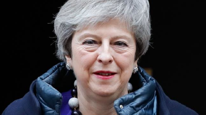 Theresa May face apel la nord-irlandezi să susţină acordul privind Brexitul

