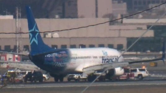 Un avion al unei companii canadiene a aterizat de urgenţă pe aeroportul Newark, deoarece existau indicii că ar fi fum în cală