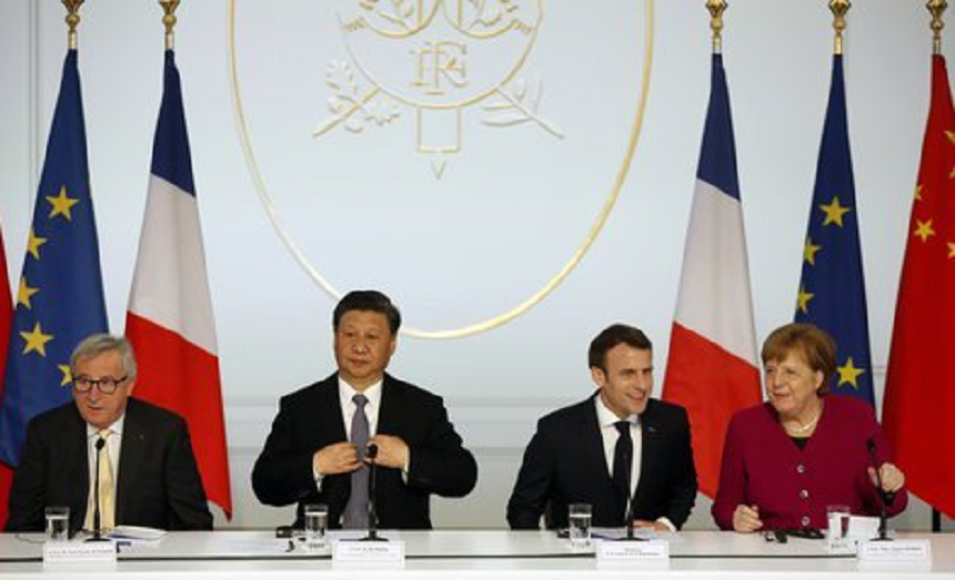 Emmanuel Macron, Angela Merkel, Jean-Claude Juncker şi Xi Jinping schiţează, într-un minisummit fără precedent la Palatul Elysée, un front comun de salvare a multilateralismului 