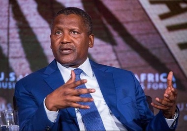 Cel mai bogat african spune că a retras cândva 10 milioane de dolari de la bancă pentru a se uita la bani şi a înţelege că nu are doar nişte numere pe hârtie