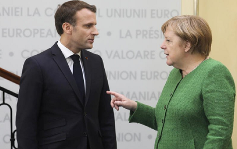 Macron o susţine pe Merkel, în cazul în care candidează la succesiunea lui Juncker la preşedinţia Comisiei Europene 