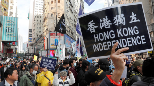 Trupe chineze la frontiera Hong Kongului, Trump se implică şi leagă criza de negocierile comerciale