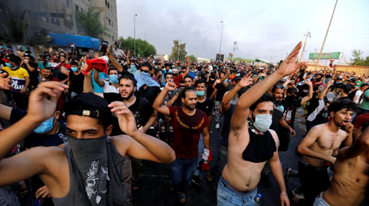 Interdicţie de circulaţie în mai multe oraşe din Irak, în urma unor manifestaţii soldate cu nouă morţi 