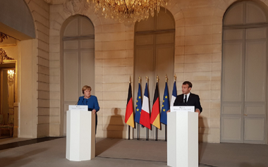 Macron şi Merkel îndeamnă Turcia să-şi operască atacul în Siria
