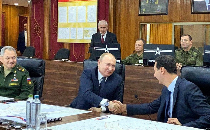Vladimir Putin se întâlneşte cu Bashar al-Assad în prima sa vizită-surpriză la Damasc şi salută ”progrese imense” în Siria, devastată de război din 2011