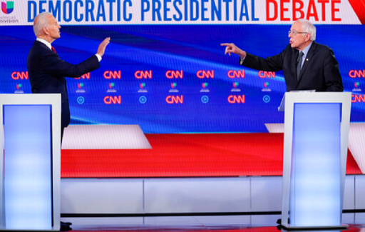 Uniţi împotriva lui Trump, Biden şi Sanders se atacă în prima dezbatere faţă în faţă pe tema trecutului lor; Biden se angajează să aibă ca parteneră de cursă o femeie