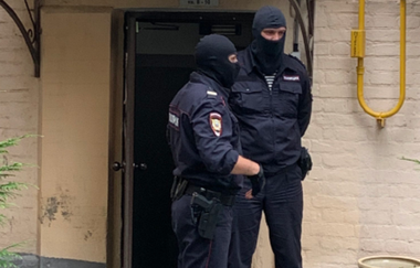 Val de percheziţii în Rusia vizând critici ai Kremlinului