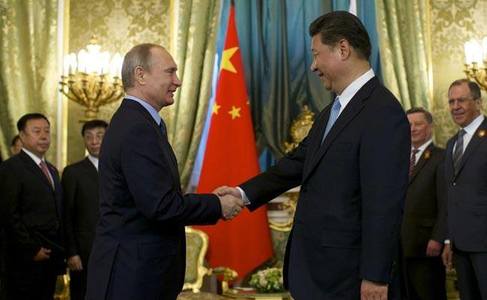 Preşedintele rus Vladimir Putin şi omologul său chinez Xi Jinping îşi consolidează parteneriatul în faţa presiunilor occidentale