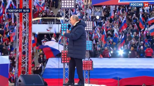 UPDATE-Putin ”dispare” brusc de pe ecranul televizorului, în timpul unui discurs, la un concert cu ocazia marcării anexării Crimeei, când era pe cale să laude eroismul militarilor care luptă în Ucraina; Kremlinul anunţă o ”pană tehnică la un server”