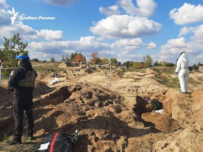 Poliţia ucraineană finalizează exhumarea cadavrelor din groapa comună descoperită în Lîman: 166 de cadavre exhumate, dintre care cinci aparţin unor copii