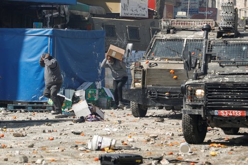 Confruntări în Cisiordania: 10 morţi şi peste 100 de răniţi în urma unui raid israelian