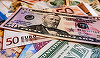 Euro se depreciază cu 1% faţă de dolar, pe o piaţă fragilizată de către bănci