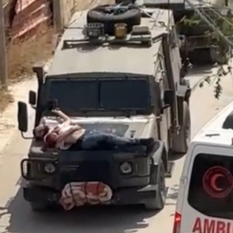 Forţele israeliene au legat un palestinian rănit de un jeep în timpul unui raid - VIDEO