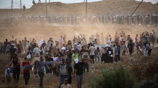 Tancurile israeliene au deschis focul şi au ucis 51 de persoane în Gaza, în timp ce acestea încercau să obţină alimente