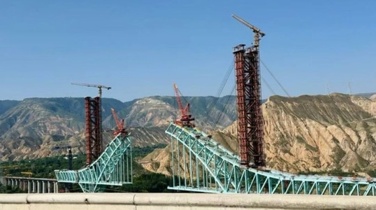 Cel puţin şase morţi şi zece răniţi în nord-vestul Chinei, în urma surpării Podului feroviar Jianzha aflat în construcţie, după ruperea unui cablu metalic de construcţie pe şantier 