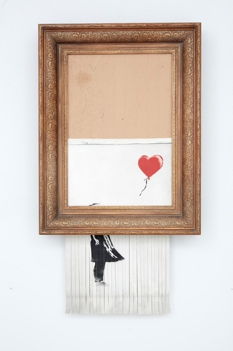 Bărbat condamnat la închisoare pentru furtul printului ”Girl with Balloon” al lui Banksy, în timpul unui jaf  la Londra