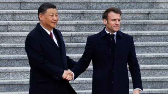 Macron a ameninţat China cu taxe vamale „în următoarele luni”