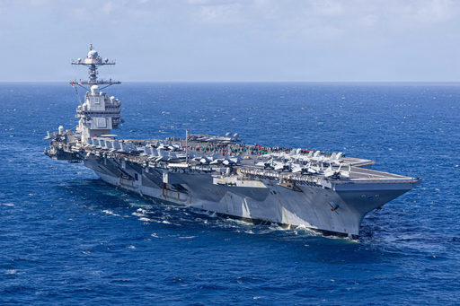 USS Gerald R. Ford, cel mai mare portavion din lume, va pleca spre insula Creta pentru reparaţii. Joacă un rol cheie în războiul dintre SUA şi Israel împotriva Iranului, dar a întâmpinat probleme în timpul misiunii sale prelungite, inclusiv un incendiu