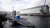 Românca arestată împreună cu un iranian pe motiv că ar fi încercat să pătrundă într-o bază britanică de submarine a scăpat deocamdată de orice procedură penală