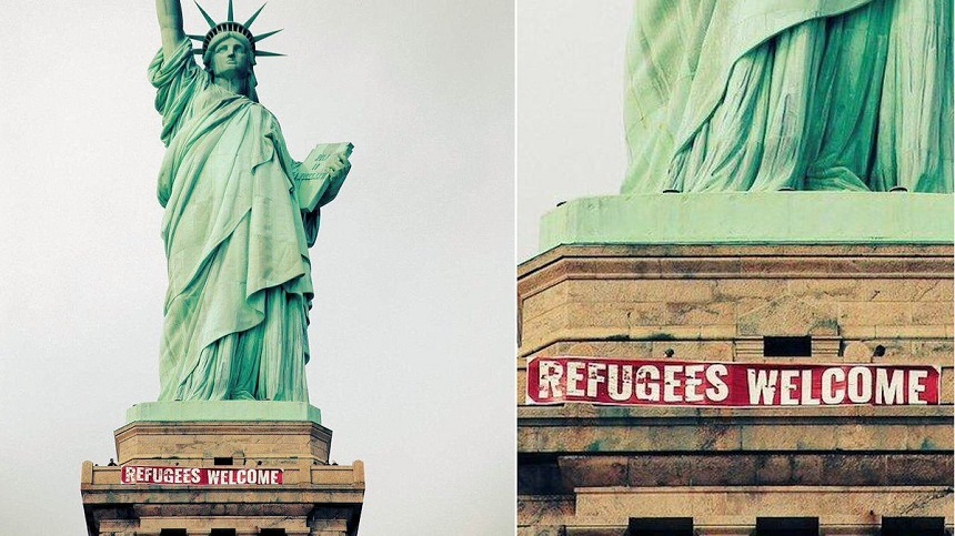 Un banner pe care scria ”Refugees Welcome” a fost agăţat de Statuia Libertăţii din New York
