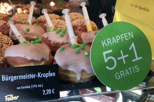 O patiserie din Viena a creat o versiune a unui preparat tradiţional adaptat pandemiei, o gogoaşă asemănătoare coronavirusului