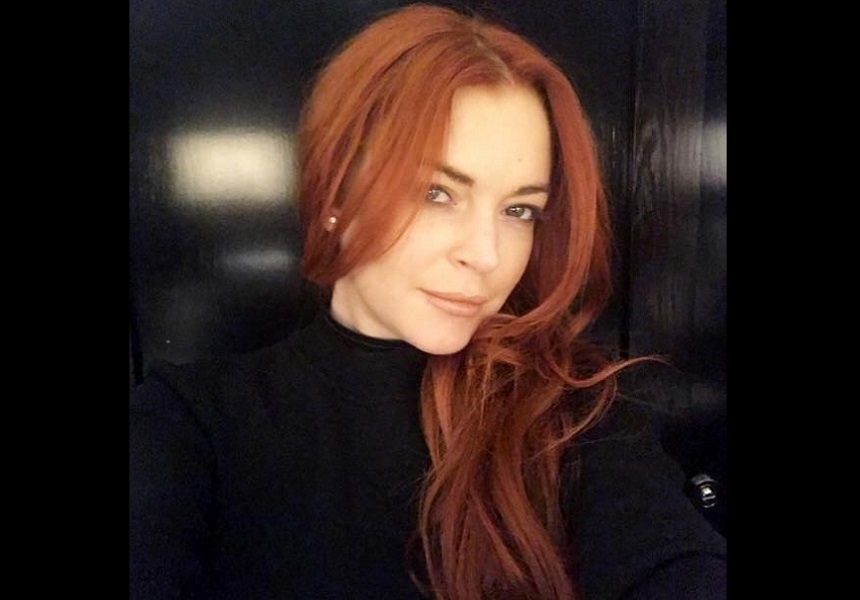 Actriţa şi cântăreaţa Lindsay Lohan a anunţat că s-a logodit