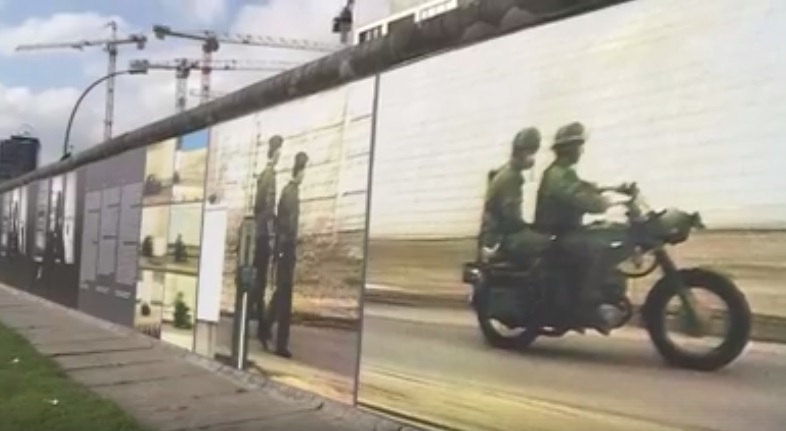 Fotografii cu soldaţi şi poveşti ale unor victime, prezentate într-o expoziţie la cel mai mare segment rămas din Zidul Berlinului