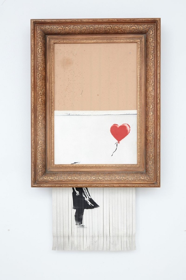 Sotheby's confirmă vânzarea lucrării "Girl with Balloon" a artistului britanic Banksy care s-a autodistrus după adjudecare - VIDEO