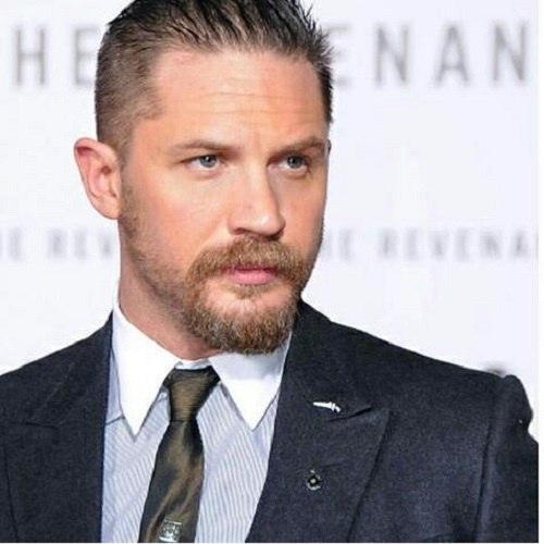 Actorul Tom Hardy şi scriitorul Ken Follett, decoraţi de prinţul Charles