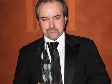 David Arnold, care a compus muzica pentru cinci filme Bond, este de părere că industria este pe marginea prăpastiei