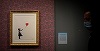 Doi bărbaţi inculpaţi după ce o operă de artă Banksy a fost furată dintr-o galerie din Londra