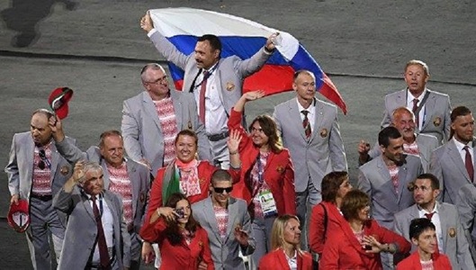 Oficialul din Belarus care a fluturat steagul Rusiei la Jocurile Paralimpice primeşte un apartament la Moscova